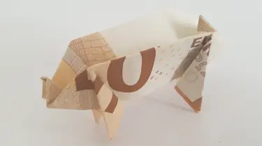 Pigs Out Of A Banknote Origami With Banknotes