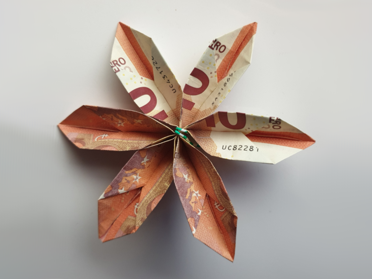 Geld falten blume kleeblatt